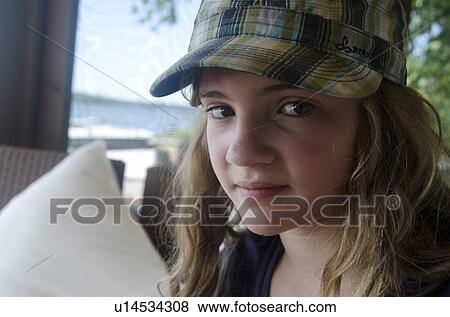 Stock Photo - Portrait of a girl. Fotosearch