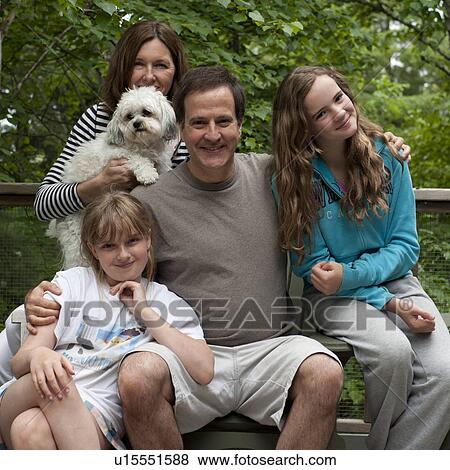 Portrait of a happy family, Lake of the Woods, Ontario, Canada View Large Photo Image Stock Photo - Portrait of a happy family, Lake of the Woods, Ontario, Canada. Fotosearch