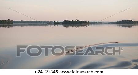 Reflection of trees in water, Lake of the Woods, Ontario, Canada View Large Photo Image Stock Photography - Reflection of trees in water, Lake of the Woods, Ontario, Canada. Fotosearch