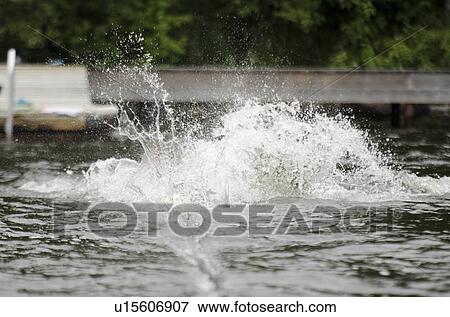 Splash of water in lake, Lake of the Woods, Ontario, Canada View Large Photo Image Stock Photo - Splash of water in lake, Lake of the Woods, Ontario, Canada. Fotosearch