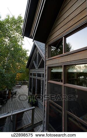 Stock Photography - Stilt house on a boardwalk, Lake of the Woods, Ontario, Canada. Fotosearch