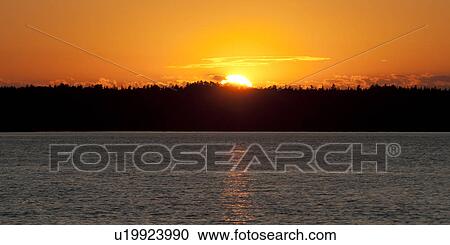 Sunset over a lake, Lake of the Woods, Ontario, Canada View Large Photo Image Stock Image - Sunset over a lake, Lake of the Woods, Ontario, Canada. Fotosearch