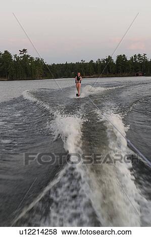 Teenage girl waterskiing in a lake, Lake of the Woods, Ontario, Canada View Large Photo Image Stock Photo - Teenage girl waterskiing in a lake, Lake of the Woods, Ontario, Canada. Fotosearch