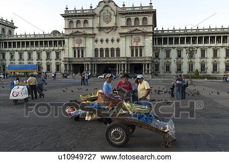 Vendor selling vegetables in front of National Palace, Guatemala City Square, Zona 1, Guatemala City, Guatemala View Large Photo Image Stock Photo - Vendor selling vegetables in front of National Palace, Guatemala City Square, Zona 1, Guatemala City, Guatemala. Fotosearch