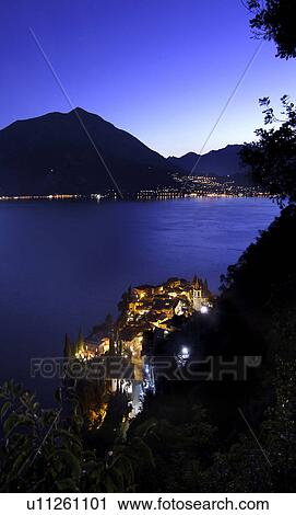 Aerial view of coastal city at night View Large Photo Image Stock Image - Aerial view of coastal city at night. Fotosearch