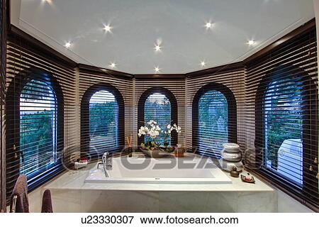 Bathtub in modern bathroom View Large Photo Image Stock Photo - Bathtub in modern bathroom. Fotosearch