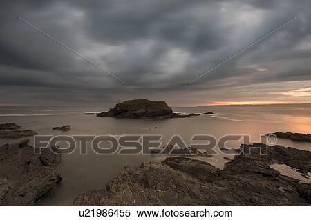 Blurred view of water washing on rocks View Large Photo Image Stock Photography - Blurred view of water washing on rocks. Fotosearch