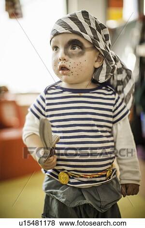 Stock Photo - Boy wearing pirate costume. Fotosearch