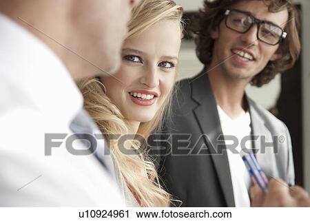 Business people talking in office View Large Photo Image Stock Image - Business people talking in office. Fotosearch