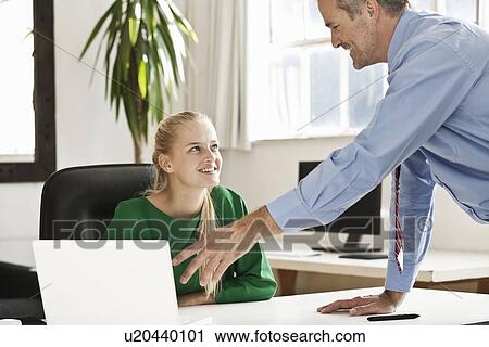 Business people talking in office View Large Photo Image Stock Image - Business people talking in office. Fotosearch