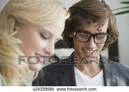 Stock Photography - Business people talking in office. Fotosearch