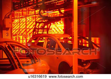 Car bodies in paint shop in car factory View Large Photo Image Stock Photo - Car bodies in paint shop in car factory. Fotosearch