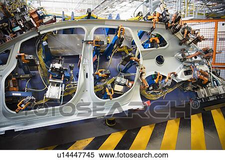 Car parts on welding jig in car factory View Large Photo Image Stock Photography - Car parts on welding jig in car factory. Fotosearch