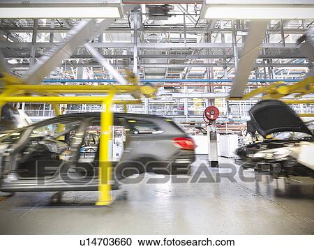 Cars on production line in car factory View Large Photo Image Stock Image - Cars on production line in car factory. Fotosearch