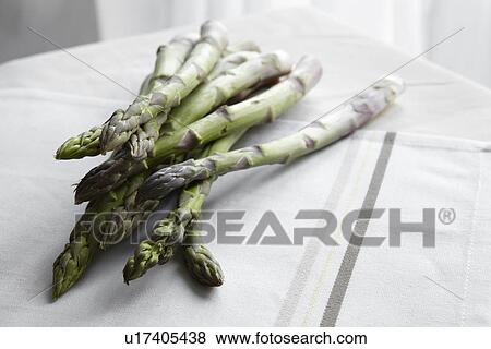 Stock Photo - Close up of asparagus stalks. Fotosearch