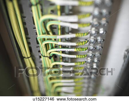 Stock Photograph - Close up of cables on computer server. Fotosearch
