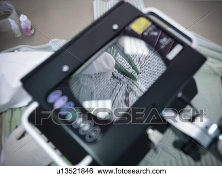 Stock Photograph - Close up of fibers in forensic lab. Fotosearch