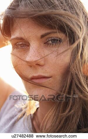 Stock Photo - Close up of girls pensive face. Fotosearch
