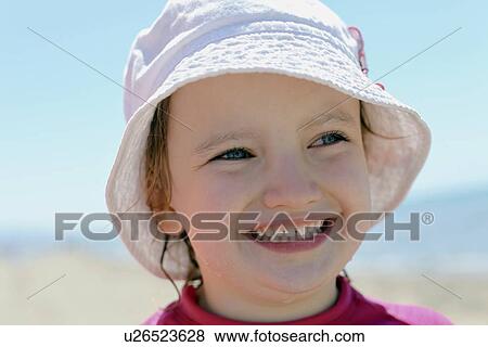 Close up of girls smiling face View Large Photo Image Stock Photo - Close up of girls smiling face. Fotosearch