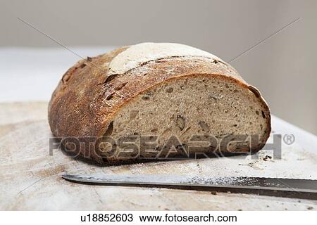 Stock Image - Close up of loaf of bread. Fotosearch