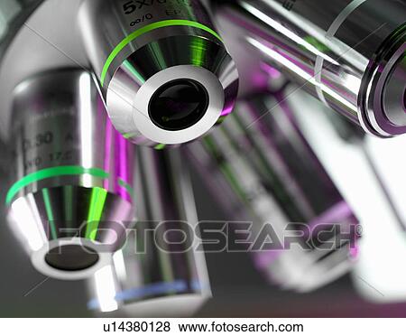 Close up of microscope lenses in lab View Large Photo Image Stock Photo - Close up of microscope lenses in lab. Fotosearch