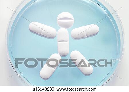 Close up of pills in stick figure shape View Large Photo Image Stock Photo - Close up of pills in stick figure shape. Fotosearch