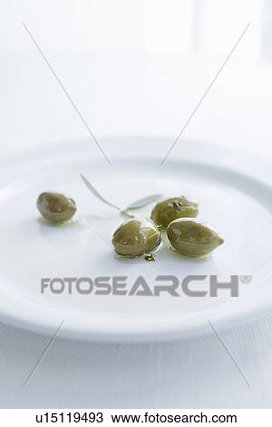 Close up of plate of olives View Large Photo Image Stock Image - Close up of plate of olives. Fotosearch