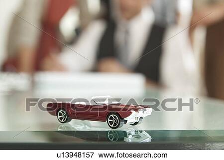 Close up of toy car on desk View Large Photo Image Stock Photo - Close up of toy car on desk. Fotosearch
