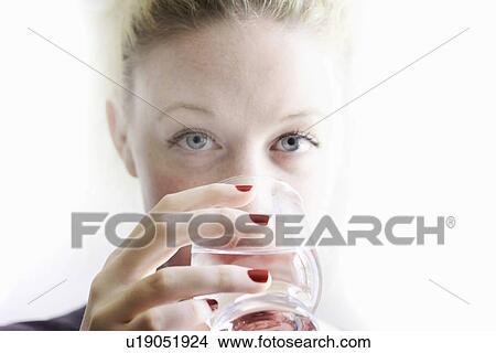 Close up of woman drinking glass of wine View Large Photo Image Picture - Close up of woman drinking glass of wine. Fotosearch