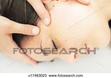 Close up of woman having scalp massage View Large Photo Image Stock Image - Close up of woman having scalp massage. Fotosearch