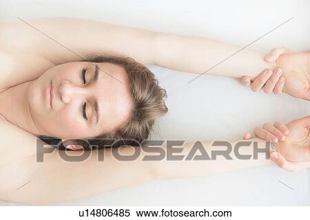 Close up of woman having wrist massage View Large Photo Image Stock Photography - Close up of woman having wrist massage. Fotosearch
