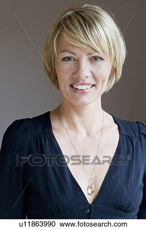 Close up of woman smiling View Large Photo Image Stock Image - Close up of woman smiling. Fotosearch