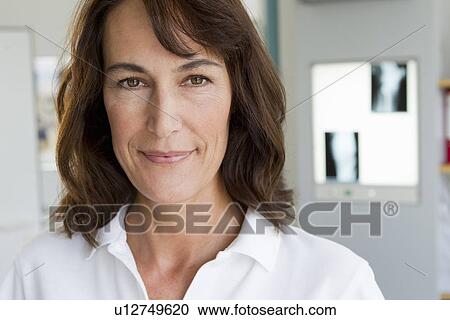 Close up of womans smiling face View Large Photo Image Stock Image - Close up of womans smiling face. Fotosearch