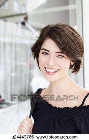 Close up of womans smiling face View Large Photo Image Stock Photograph - Close up of womans smiling face. Fotosearch