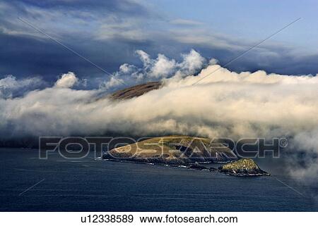 Stock Photo - Clouds over rural islands. Fotosearch