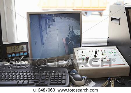 Computer displaying security camera View Large Photo Image Stock Image - Computer displaying security camera. Fotosearch