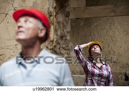 Construction workers on site View Large Photo Image Stock Image - Construction workers on site. Fotosearch