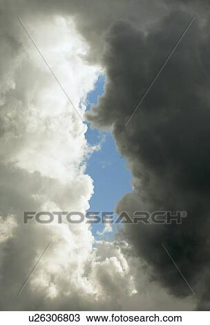 Dark and light clouds in blue sky View Large Photo Image Stock Image - Dark and light clouds in blue sky. Fotosearch