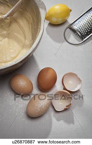 Eggshells, flour, lemon and batter View Large Photo Image Stock Photo - Eggshells, flour, lemon and batter. Fotosearch