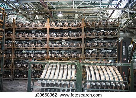 Stock Image - Engines store in car factory. Fotosearch