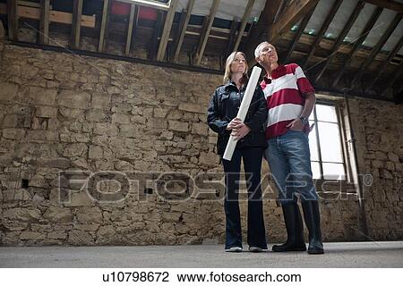 Father and daughter examining building View Large Photo Image Stock Image - Father and daughter examining building. Fotosearch
