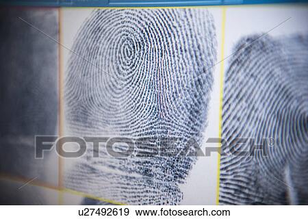 Stock Photo - Fingerprints on screen in forensic lab. Fotosearch