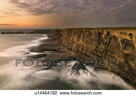 Fog rolling up to rocky coastal cliffs View Large Photo Image Stock Image - Fog rolling up to rocky coastal cliffs. Fotosearch