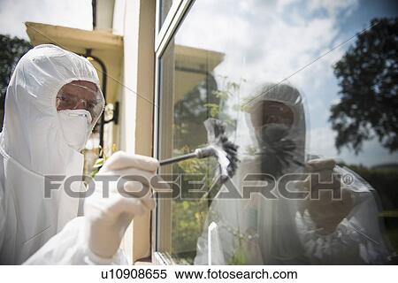 Forensic scientist dusting window View Large Photo Image Stock Photography - Forensic scientist dusting window. Fotosearch