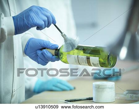 Forensic student dusting fingerprints View Large Photo Image Stock Photo - Forensic student dusting fingerprints. Fotosearch