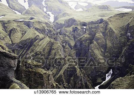 Stock Photography - Frozen streams on rocky mountainsides. Fotosearch