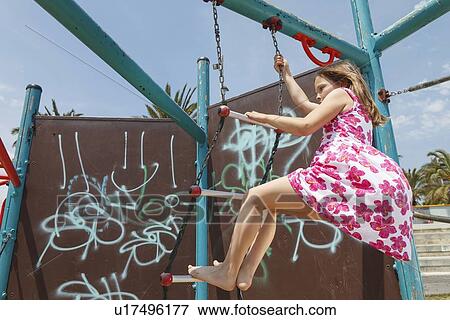Girl on playground ladder outdoors View Large Photo Image Stock Photo - Girl on playground ladder outdoors. Fotosearch