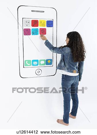Girl playing with drawing of smartphone View Large Photo Image Stock Image - Girl playing with drawing of smartphone. Fotosearch