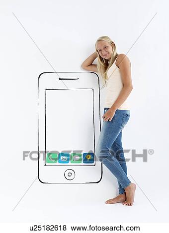 Stock Photo - Girl standing by drawing of smartphone. Fotosearch