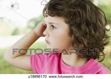 Girl standing outdoors View Large Photo Image Stock Image - Girl standing outdoors. Fotosearch